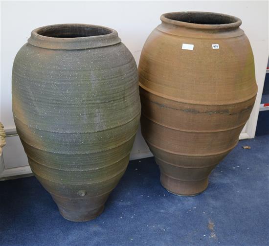 Two large olive jars W.60cm (one a.f.)